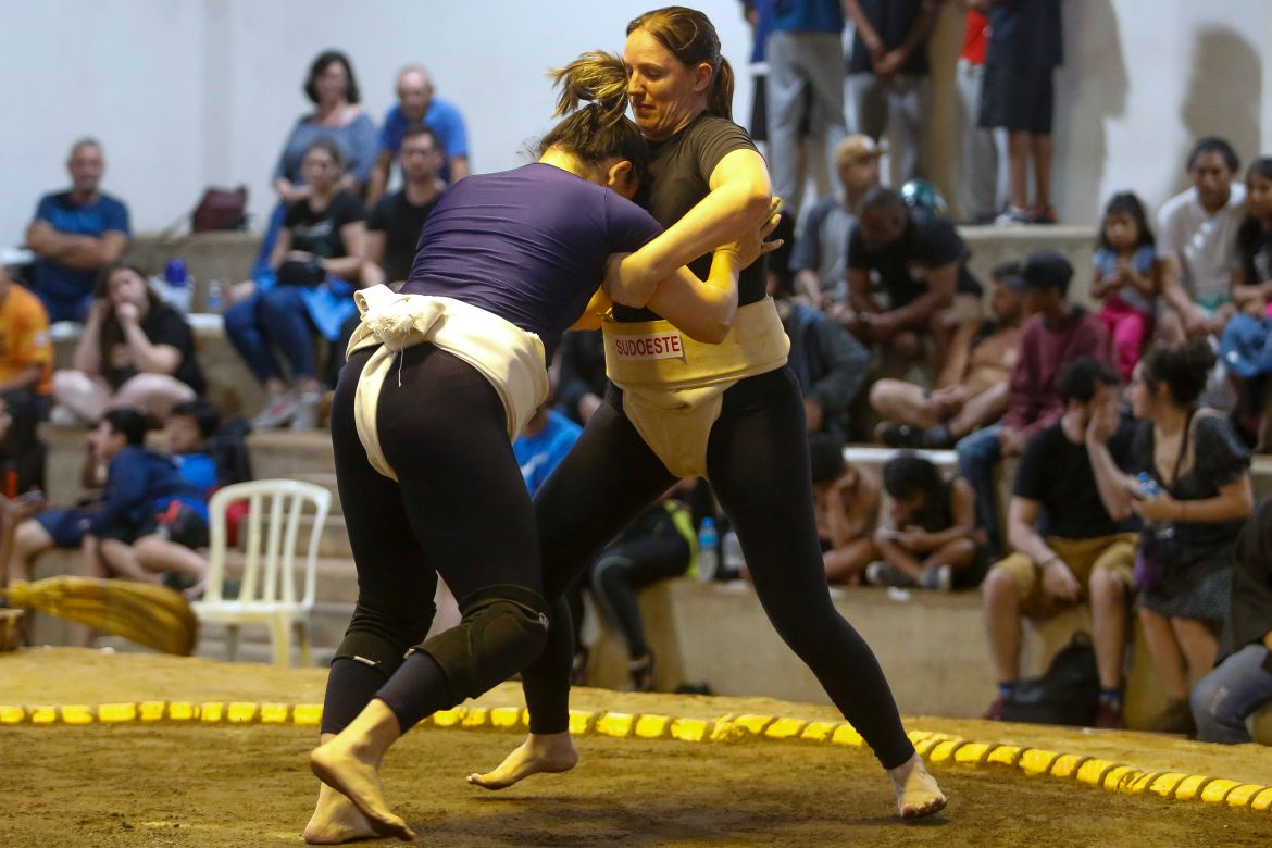 Sumo wrestlers fight during a Brazilian sumo championship bout, a qualifier for the South American championship, in Sao Paulo, Brazil