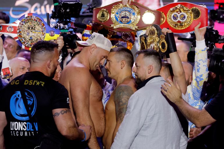 Boxing - Tyson Fury v Oleksandr Usyk - Weigh-in - BLVD City - Music World, Riyadh, Saudi Arabia - May 17, 2024 Tyson Fury and Oleksandr Usyk face off during the weigh-in Action Images via Reuters/Andrew Couldridge