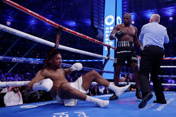 Boxing - Daniel Dubois v Anthony Joshua - IBF World Heavyweight Title - Wembley Stadium, London, Britain - September 21, 2024 Anthony Joshua after being knocked down by Daniel Dubois Action Images via Reuters/Andrew Couldridge