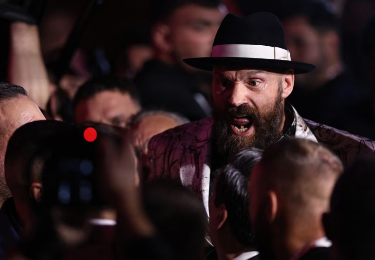 Boxing - Heavyweight World Title Fight - Oleksandr Usyk v Tyson Fury - Press Conference - VIA Riyadh, Riyadh, Saudi Arabia - December 19, 2024 Tyson Fury reacts during the press conference REUTERS/Hamad I Mohammed