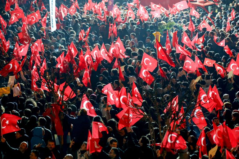 Supporters of Istanbul Mayor Ekrem Imamoglu gather outside the Istanbul Metropolitan Municipality building to protest, March 19, 2025. [Murad Sezer/Reuters]