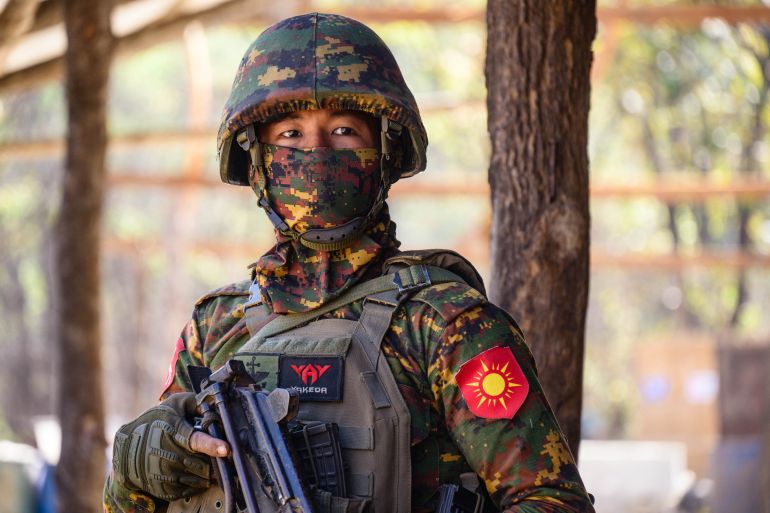 In this photo taken on January 24, 2026, a soldier stands guard during a press tour at a drug production site southwest of Mongyai, northern Shan State, that was captured by the Myanmar military. The Southeast Asian country has long been a hive for illegal drug trade, but analysts say the civil war triggered by a 2021 military coup has increased production and trafficking. (Photo by ANTHONY WALLACE / AFP)