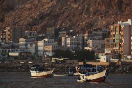 In this Thursday, Nov. 29, 2018 photograph, boats are anchored near Mukalla, Yemen. The port city of Mukalla, once held by al-Qaida, shows how fractious Yemen is and will remain even if the Saudi-led war in the country ends in an uneasy peace for the Arab world's poorest nation. (AP Photo/Jon Gambrell)