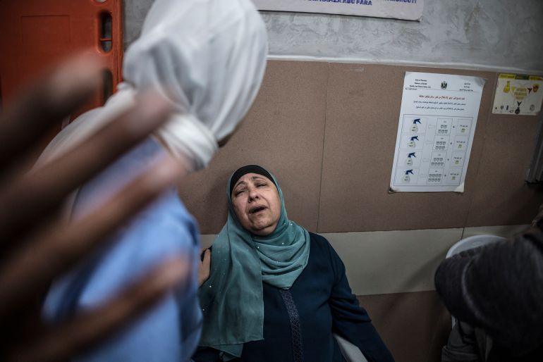 EDITORS NOTE: Graphic content / The parents of a man who was killed in alleged Israeli settler gunfire in the village of Al-Mughayyir, east of Ramallah in Israeli-occupied West Bank, mourn at a hospital in Ramallah on April 21, 2026.