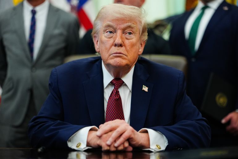 President Donald Trump listens in the Oval Office of the White House, Saturday, April 18, 2026, in Washington. (AP Photo/Julia Demaree Nikhinson)