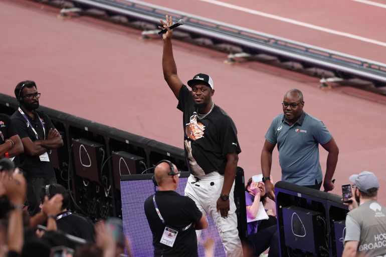 TOKYO, JAPAN - SEPTEMBER 14: Retired Jamaican sprinter Usain Bolt acknowledges the crowd on day two of the World Athletics Championships Tokyo 2025 at National Stadium on September 14, 2025 in Tokyo, Japan. (Photo by Michael Steele/Getty Images)